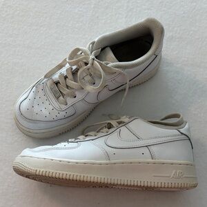 Nike White Sneakers with Gray Accents